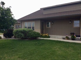 387-397 Central Ave in South Heart, ND - Building Photo