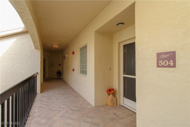 property at 7024 Pelican Bay Blvd