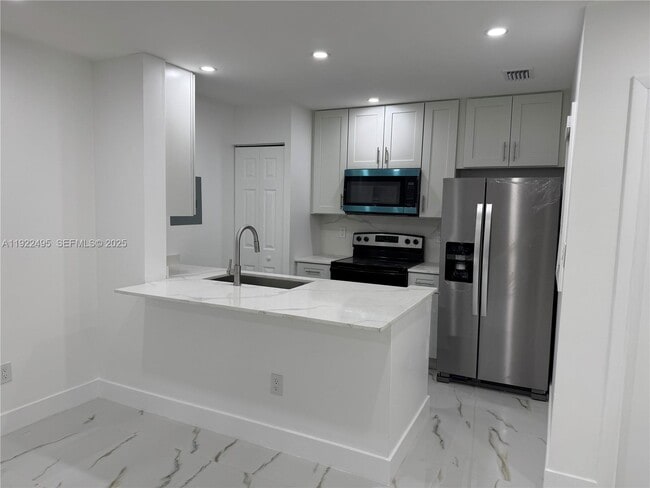 property at 9726 Hammocks Blvd