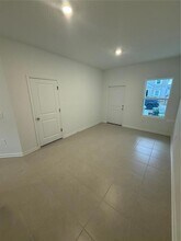 3047 Mindfullness Dr, Unit C203 in Clermont, FL - Building Photo - Building Photo