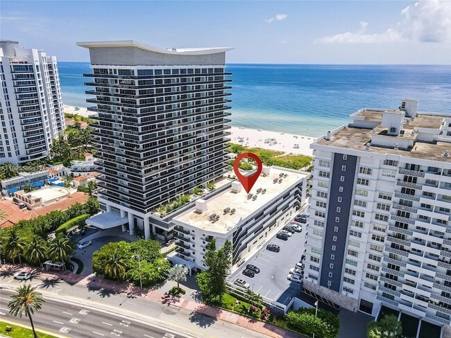 property at 5845 Collins Ave