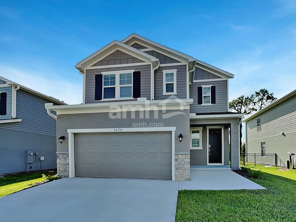 5678 Oesterle Rd in St. Cloud, FL - Building Photo