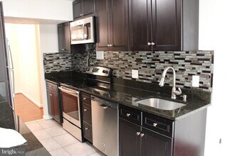 7927 Mandan Rd-Unit -204 in Greenbelt, MD - Building Photo - Building Photo