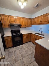 7125 N Lagoon Dr in Panama City Beach, FL - Foto de edificio - Building Photo