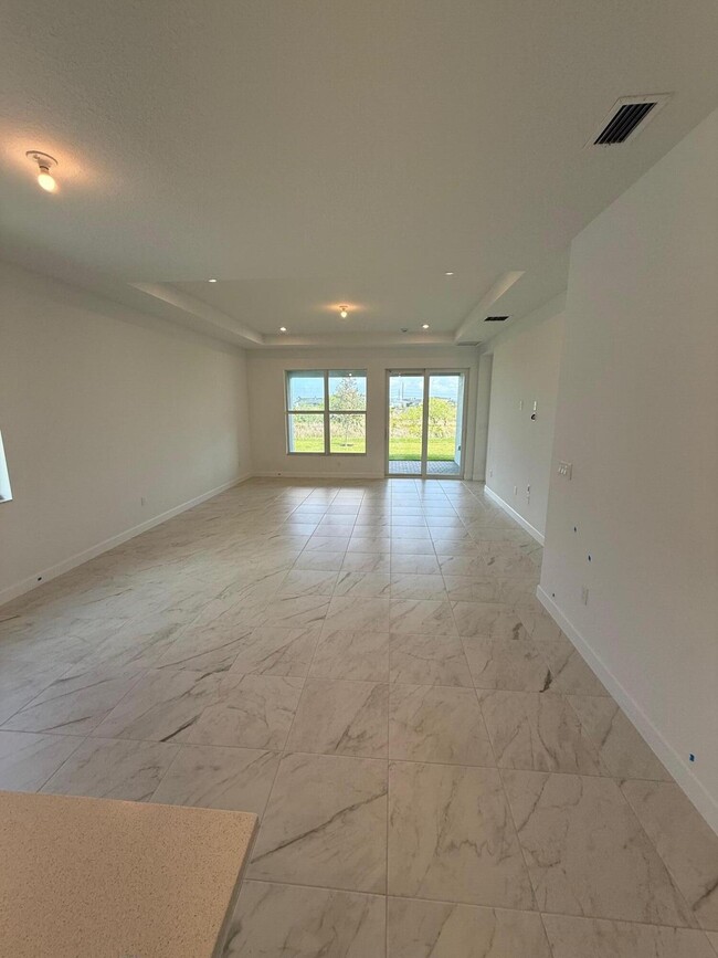 13509 SW Bally Dr in Port St. Lucie, FL - Building Photo - Building Photo