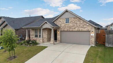 450 Durian Lp in Mustang Ridge, TX - Building Photo - Building Photo