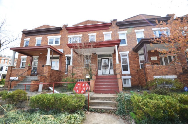 property at 107 E 32nd St