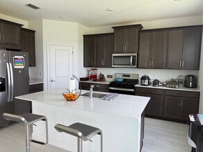 14114 SW Surina St in Port St. Lucie, FL - Building Photo - Building Photo