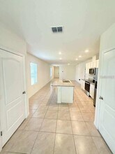 6877 Botanic Blvd in Harmony, FL - Foto de edificio - Building Photo