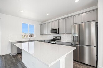 8728 Hotchkiss St in Littleton, CO - Foto de edificio - Building Photo