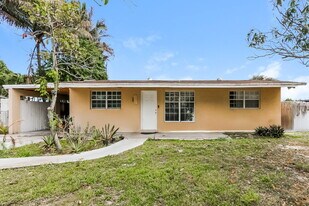 2120 W Carol Cir in West Palm Beach, FL - Building Photo