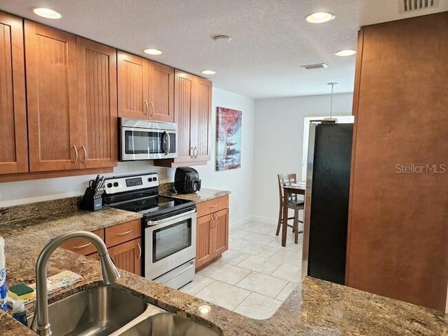 6618 7th Ave Cir W, Unit 1404 in Bradenton, FL - Foto de edificio - Building Photo