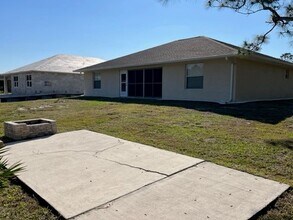 1126 Calmar Ave in Lehigh Acres, FL - Building Photo - Building Photo
