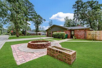 1703 N Roberson St in Conroe, TX - Building Photo - Building Photo