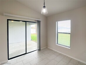 1447 NW 1st St in Cape Coral, FL - Foto de edificio - Building Photo