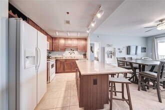 9860 S Thomas Dr in Panama City Beach, FL - Building Photo - Building Photo