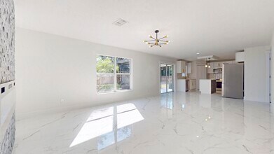 2056 SW Grant Ave in Port St. Lucie, FL - Building Photo - Building Photo