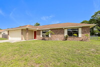 411 Vin Rose Cir SE in Palm Bay, FL - Foto de edificio - Building Photo