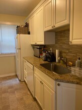 552 Rogers St, Unit 1 in Lowell, MA - Foto de edificio - Building Photo
