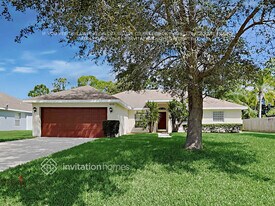 409 NW Concord Dr in Port St. Lucie, FL - Building Photo
