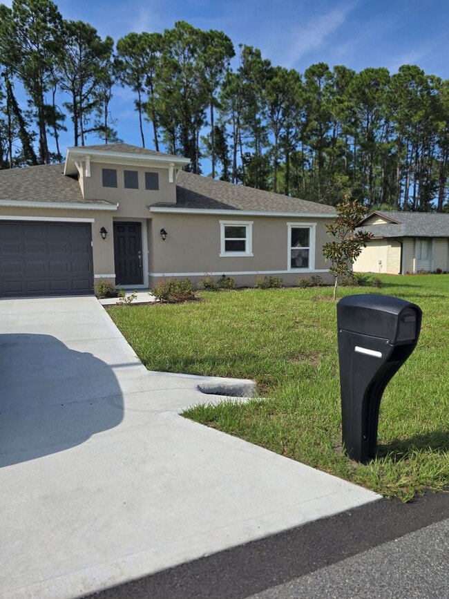 145 Palmwood Dr in Palm Coast, FL - Building Photo - Building Photo