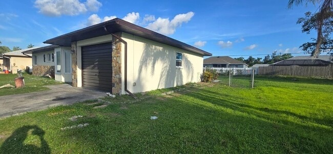 23067 Elmira Blvd in Port Charlotte, FL - Building Photo - Building Photo
