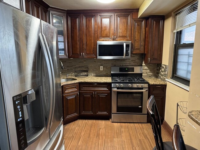 property at 61-55-61-98 98th St