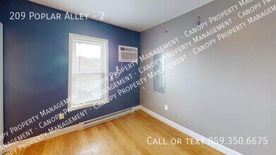 209 Poplar Alley in Russell, KY - Building Photo - Building Photo