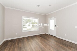 1113 Morton St E in Lehigh Acres, FL - Foto de edificio - Building Photo