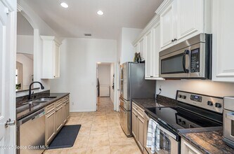 499 Bayard Ave NE, Unit 1030H in Palm Bay, FL - Foto de edificio - Building Photo