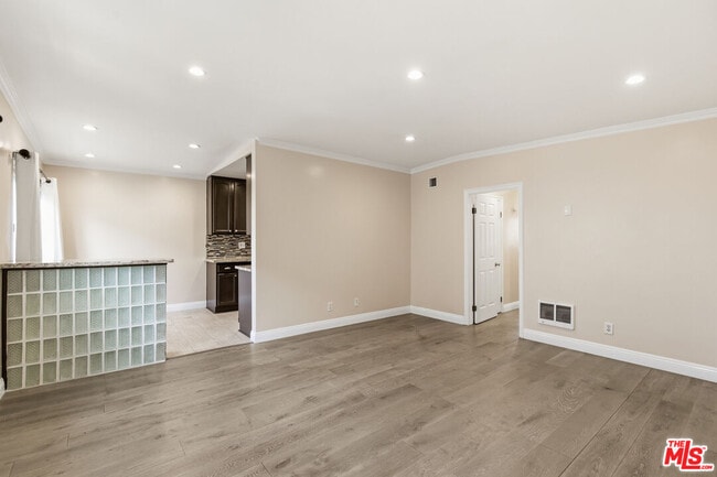 property at 8710 Belford Ave