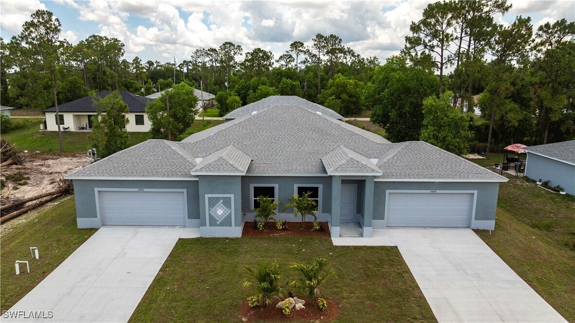 2422 Mae Ave S in Lehigh Acres, FL - Building Photo