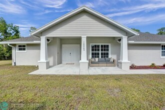 14845 60th Ct N in Loxahatchee, FL - Foto de edificio - Building Photo