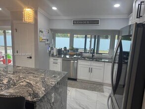 702 NW Orchid St in Port St. Lucie, FL - Building Photo - Building Photo