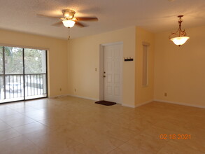 2114 SW Silver Pine Way, Unit 121-E2 in Palm City, FL - Building Photo - Building Photo