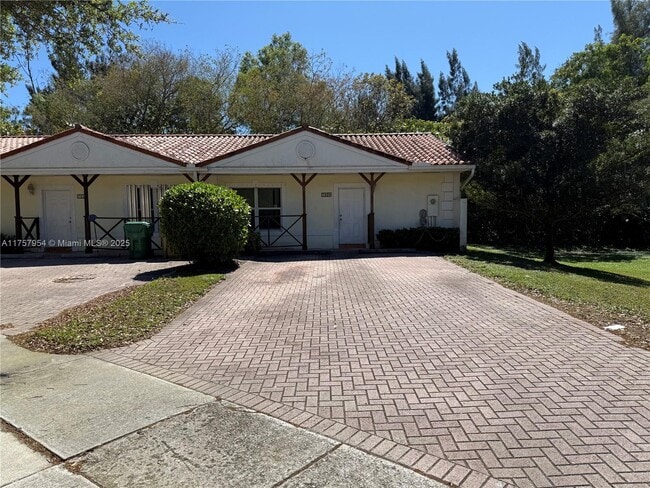 property at 7620 NW 38th Ct