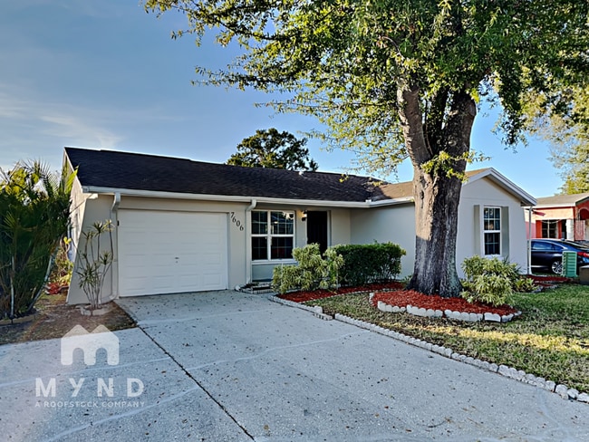 property at 7606 Woodland Oaks Ct