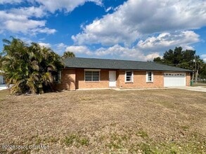7746 Mango Grove Ave in Melbourne, FL - Building Photo - Building Photo