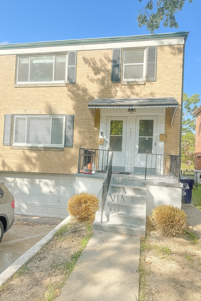 property at 7055 Amherst Ave