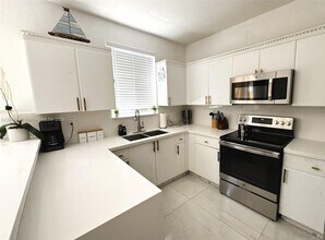 7020 NW 177th St in Miami Gardens, FL - Building Photo - Building Photo