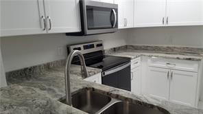 8304 Key Royal Cir-Unit -1711 in Naples, FL - Building Photo