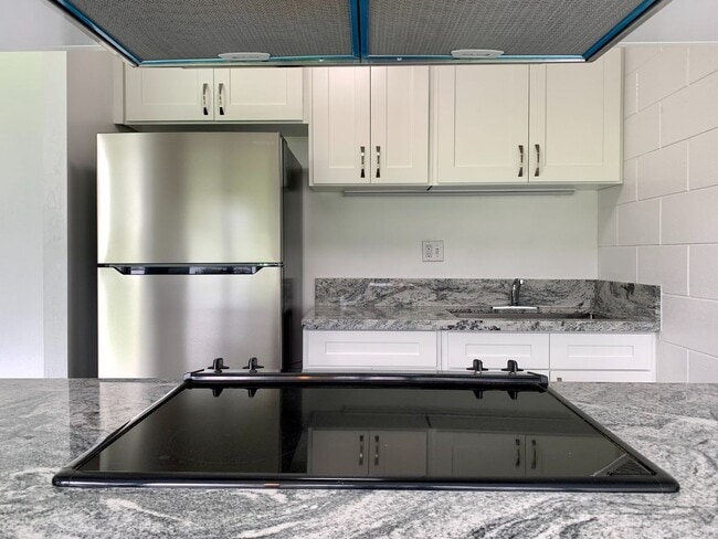 property at 95-015 Kuahelani Ave