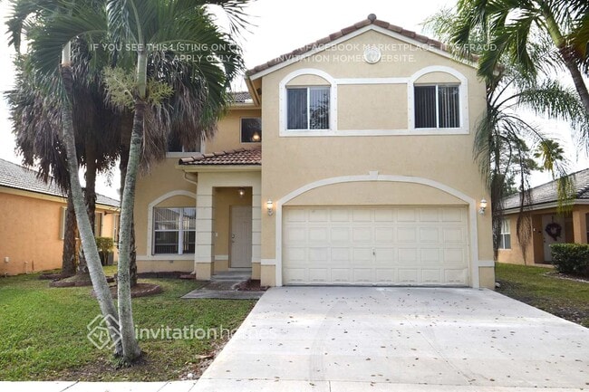 property at 13440 SW 24th St