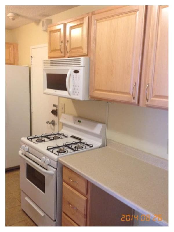 property at 77 Pond Ave