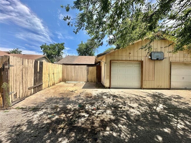 property at 207 W William Cannon Dr
