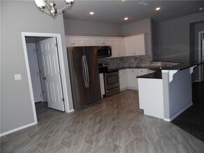 303 Wood Creek St in Lowell, AR - Building Photo - Building Photo