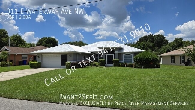 property at 311 E Waterway Ave NW
