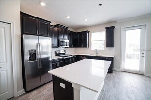 1225 Payne Stewart Dr in Davenport, FL - Building Photo