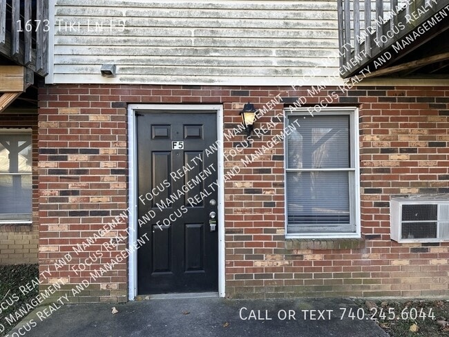 property at 1673 Tiki Ln