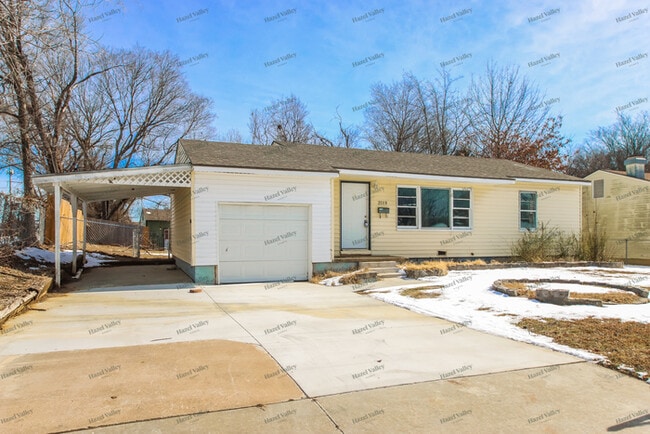 property at 3519 N Lansing Ave.